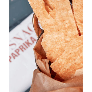 Crispy snack Potato & Paprika van Nicolas Vahe, van dichtbij met etiket en productdetails zichtbaar