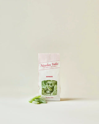 Groene appel snoepjes 150g van Nicolas Vahe, in een culinaire setting met bijpassende ingrediënten