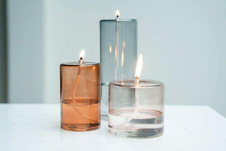 olielamp roze 9cm van Wellmark, samen met bijpassende verzorgingsproducten